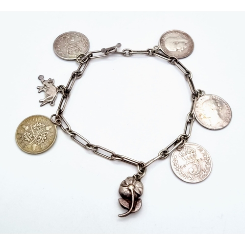 876 - An Antique Silver Threepence Bracelet. Five Edward VII threepence coins. 17cm.