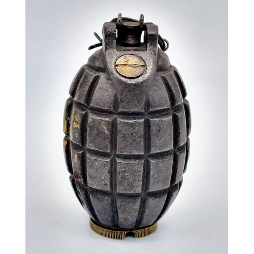 111 - An INERT WW1 British No 5 MK1 Mills Grenade. Maker: Glover and Mail LTD Dated February 1916.