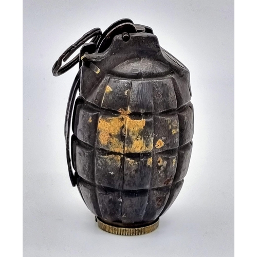 111 - An INERT WW1 British No 5 MK1 Mills Grenade. Maker: Glover and Mail LTD Dated February 1916.