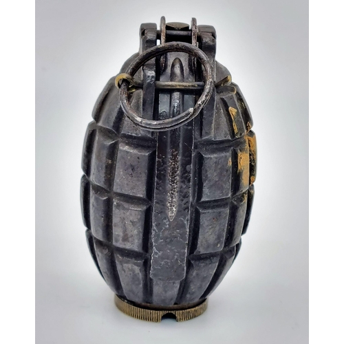 111 - An INERT WW1 British No 5 MK1 Mills Grenade. Maker: Glover and Mail LTD Dated February 1916.