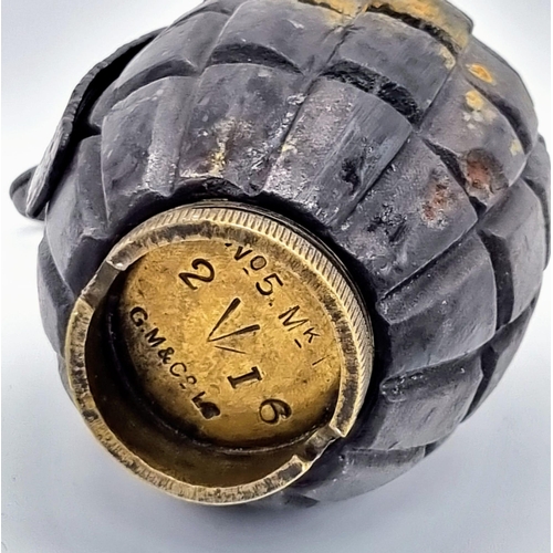 111 - An INERT WW1 British No 5 MK1 Mills Grenade. Maker: Glover and Mail LTD Dated February 1916.