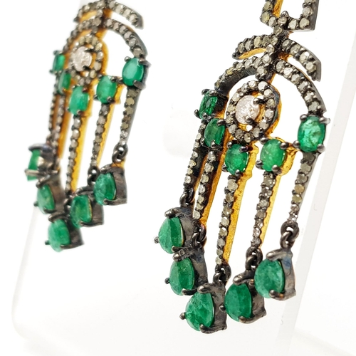 122 - An Antique-Styled Pair of Emerald And Diamond Drop Earrings, set in 925 Silver. Diamond weight - 3ct... 