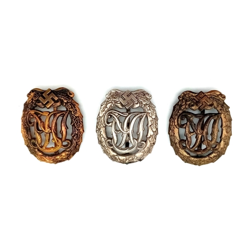 91 - A WW2 German DRL Sports Badge Set. Bronze, Silver and Gold.