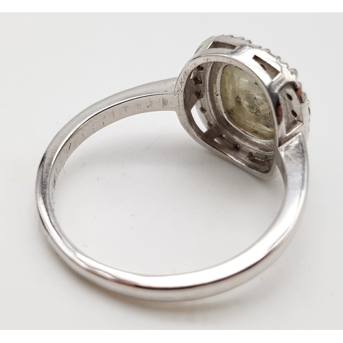 153 - An Unusual 14K White Gold 1.75ct Light Grey Diamond Ring with a further 0.21Ct of Diamond Surrounds.... 