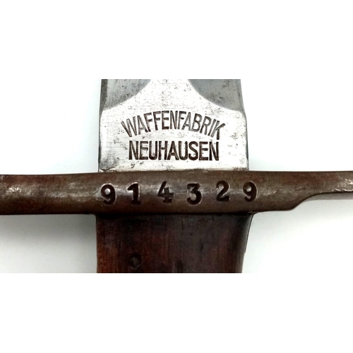 190 - A WW1 WaffenFabrik Neuhausen Bayonet with Scabbard. Number on hilt - 914329. Swiss made. In good con... 