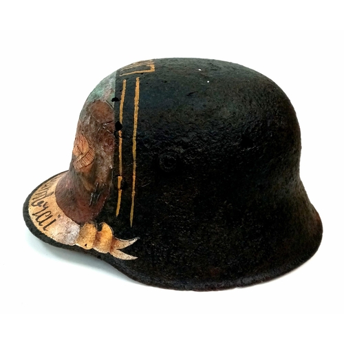 316 - A WW1 German M16 Stahlhelm. Found in Cambrai with post war memorial painting.