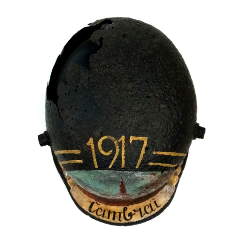 316 - A WW1 German M16 Stahlhelm. Found in Cambrai with post war memorial painting.