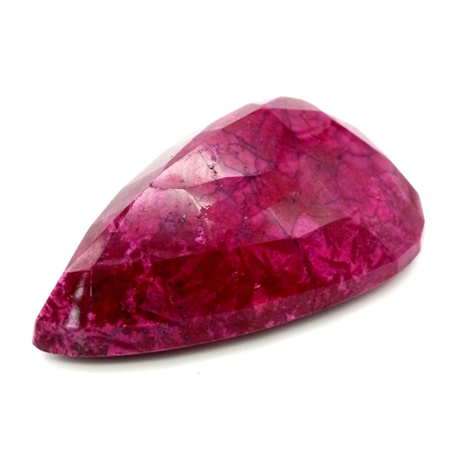 32 - A Humongous 5540ct Pear Cut Natural Earth Mined Ruby. Colour Enhanced. 16 x 11cm.