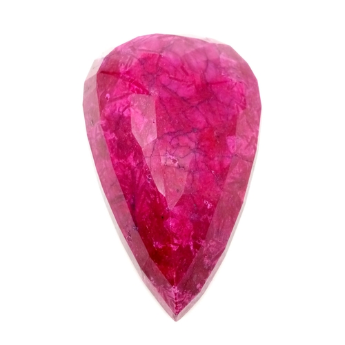 32 - A Humongous 5540ct Pear Cut Natural Earth Mined Ruby. Colour Enhanced. 16 x 11cm.