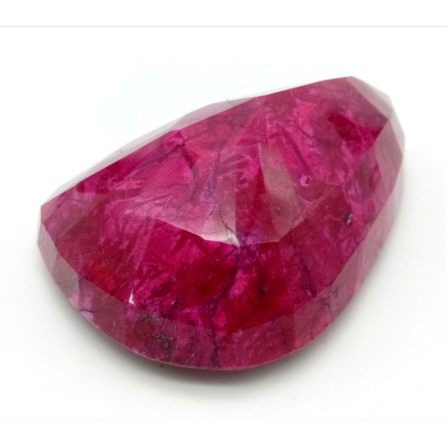 32 - A Humongous 5540ct Pear Cut Natural Earth Mined Ruby. Colour Enhanced. 16 x 11cm.