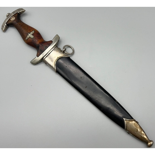 35 - A 3rd Reich Early N.S.K.K. Dagger. Maker: S.M.F. (Seated King) No. 7 on the McGarr list 10 being the... 