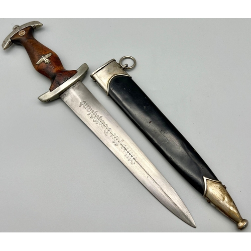 35 - A 3rd Reich Early N.S.K.K. Dagger. Maker: S.M.F. (Seated King) No. 7 on the McGarr list 10 being the... 