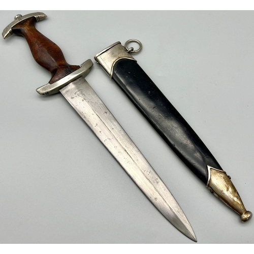 35 - A 3rd Reich Early N.S.K.K. Dagger. Maker: S.M.F. (Seated King) No. 7 on the McGarr list 10 being the... 