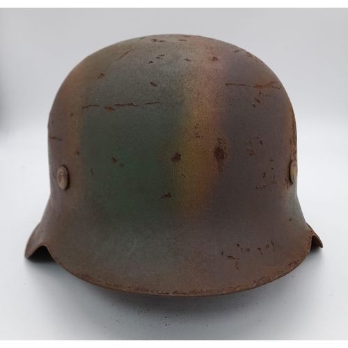 49 - A WW2 Germany, Normandy M42 Helmet. Stamped E.T. 62 for the factory Eisenhutten Werke, Thale. Size 6... 