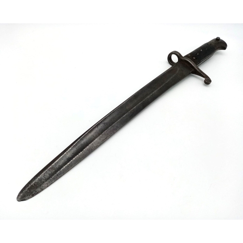 196 - An Antique Martini Bayonet. Military markings on blade. No scabbard. Please see photos for condition... 