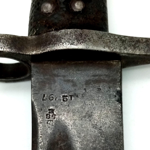 196 - An Antique Martini Bayonet. Military markings on blade. No scabbard. Please see photos for condition... 