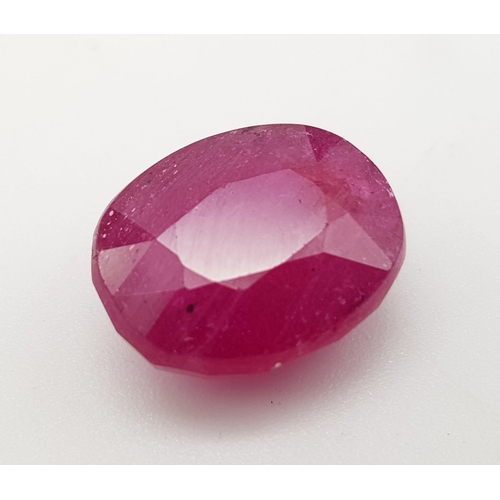 820 - A 10.95ct Oval Cut Natural Ruby.Crystalline Inclusions and Clarity enhanced. GLI Certified.