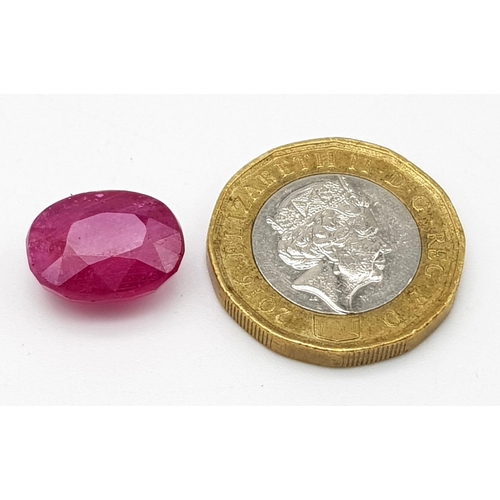 820 - A 10.95ct Oval Cut Natural Ruby.Crystalline Inclusions and Clarity enhanced. GLI Certified.