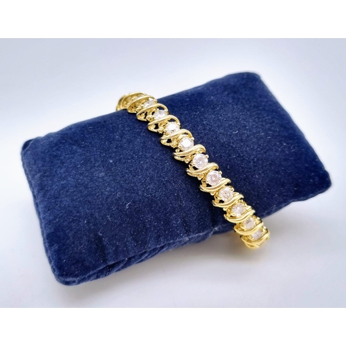 123 - A Serious 18K Yellow Gold Diamond Tennis Bracelet. 31 Brilliant round cut diamonds - Approx 4.5ct. 1... 