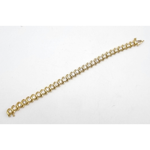 123 - A Serious 18K Yellow Gold Diamond Tennis Bracelet. 31 Brilliant round cut diamonds - Approx 4.5ct. 1... 