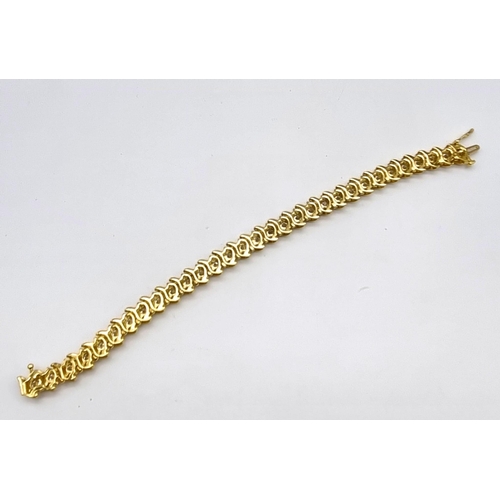 123 - A Serious 18K Yellow Gold Diamond Tennis Bracelet. 31 Brilliant round cut diamonds - Approx 4.5ct. 1... 