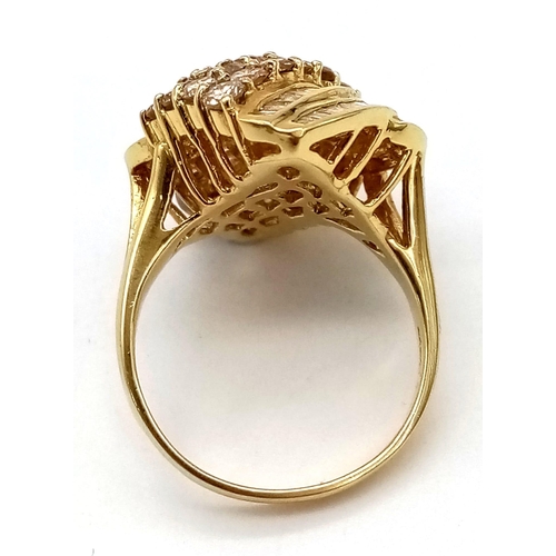 249 - An 18K Yellow Gold Diamond Wave Ring. Four diagonal rows of round cut diamonds with three waves of b... 