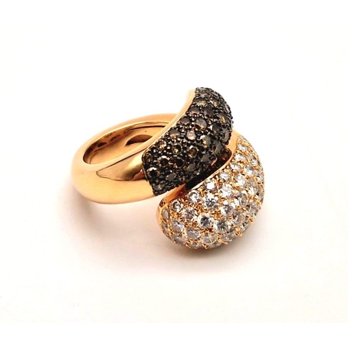 43 - An Impressive 18K Rose Gold Black and White Diamond Twist Ring. Approximately 4ct diamond weight. Si... 