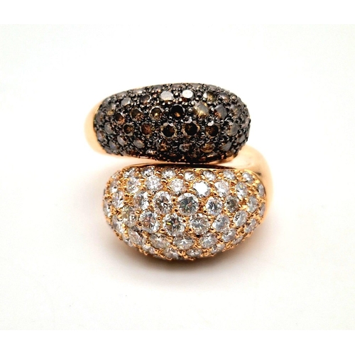 43 - An Impressive 18K Rose Gold Black and White Diamond Twist Ring. Approximately 4ct diamond weight. Si... 