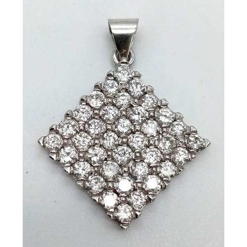 66 - An 18K White Gold Diamond - Diamond Shaped Pendant. Approximately 2ct of brilliant round-cut diamond... 