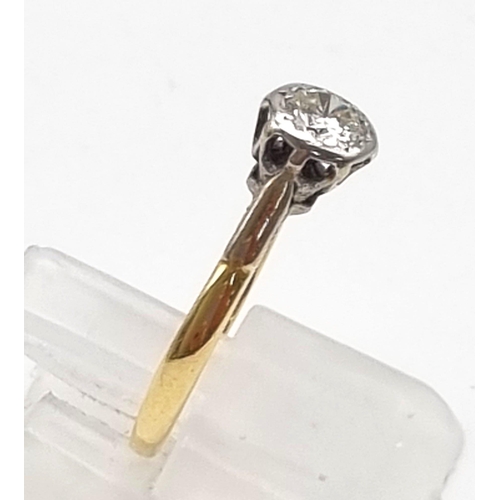 95 - An 18K Yellow Gold Diamond Solitaire Ring. Size L 1/2. 0.25ct. 2.27g total weight.