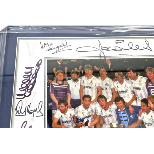 207 - A SIGNED PHOTO OF THE 1984 TOTTENHAM HOTSPUR UEFA CUP WINNING TEAM.  56 X 46cms