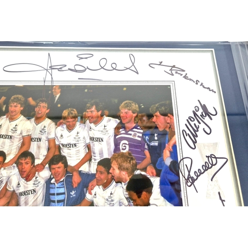 207 - A SIGNED PHOTO OF THE 1984 TOTTENHAM HOTSPUR UEFA CUP WINNING TEAM.  56 X 46cms