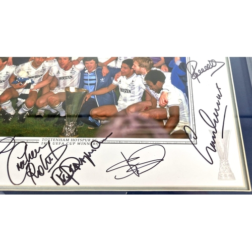 207 - A SIGNED PHOTO OF THE 1984 TOTTENHAM HOTSPUR UEFA CUP WINNING TEAM.  56 X 46cms