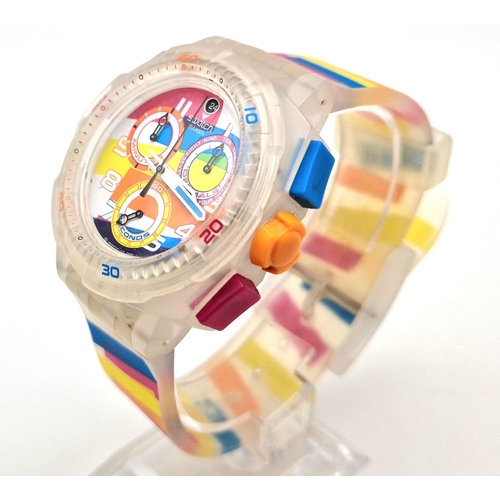 322 - A Swatch Summer Curves Chronograph Watch. Multi-coloured strap and case. In good condition and worki... 