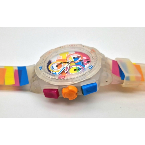 322 - A Swatch Summer Curves Chronograph Watch. Multi-coloured strap and case. In good condition and worki... 