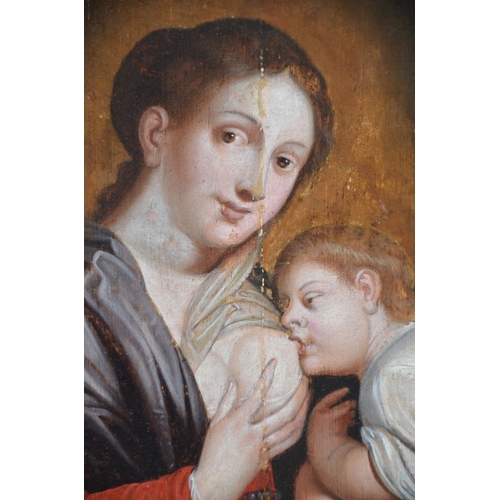 46 - An Oil on Canvas Painting. 'Madonna with child'. 