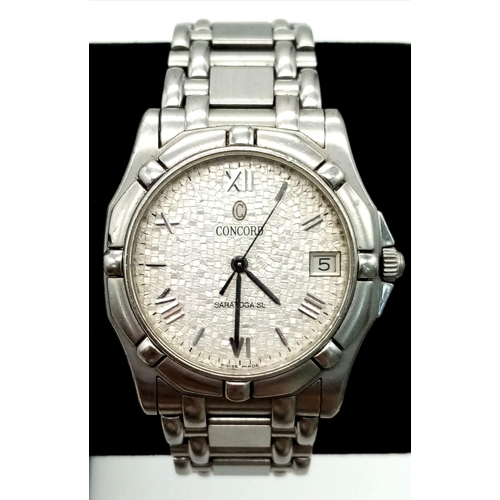 24 - A Concord Saratoga Quartz Gents Watch. Stainless steel strap and case - 35mm. White pave-effect dial... 