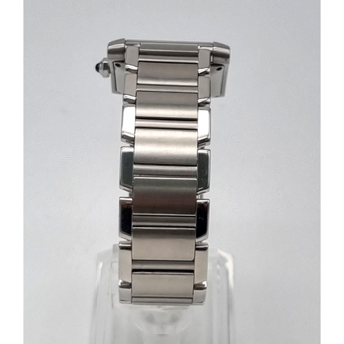 278 - An Automatic Cartier Gents Tank Watch. Stainless steel strap and case. 30 x 33mm. White dial with ro... 