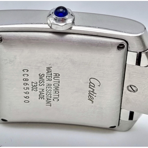 278 - An Automatic Cartier Gents Tank Watch. Stainless steel strap and case. 30 x 33mm. White dial with ro... 