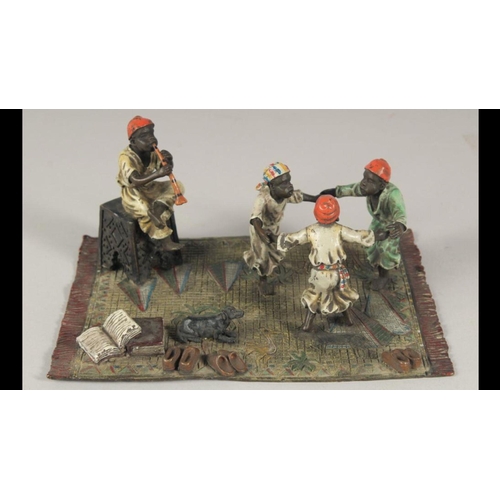 262 - A Austrian cold painted group of boys playing 
7.5 inches wide 