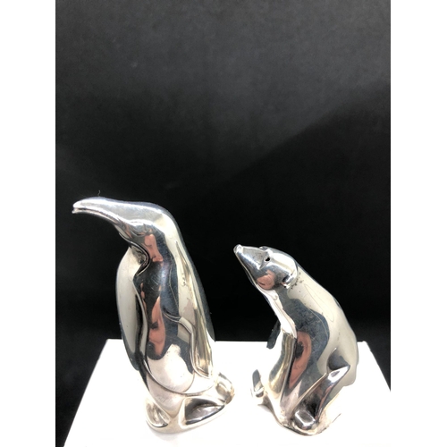 68 - Stunning sterling silver novelty pair of salt/pepper pots.
By David Anderson 
Polar bear  and pengui... 