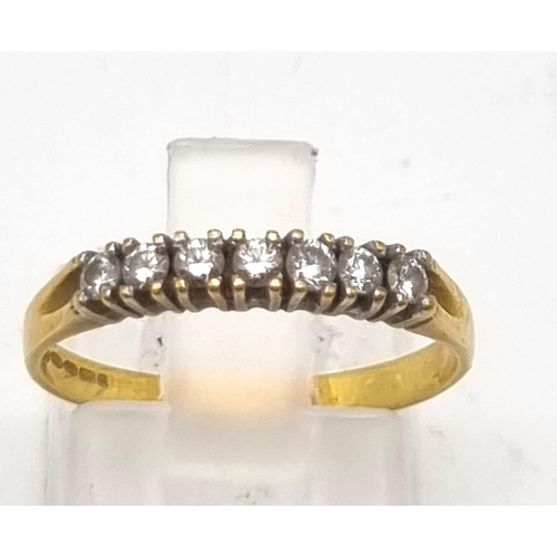 51 - An 18K Yellow Gold Seven-Diamond Ladies Ring. Seven brilliant round cut diamonds. Size M 1/2. 2.2g t... 