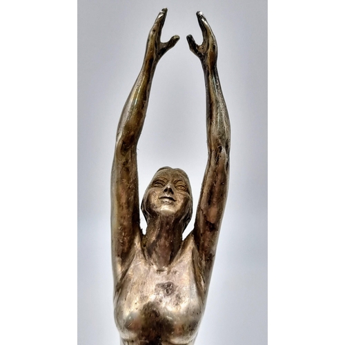 62 - An Art Deco sterling silver statuette of a naked lady. Height: 28 cm, weight: 1.25 Kg.