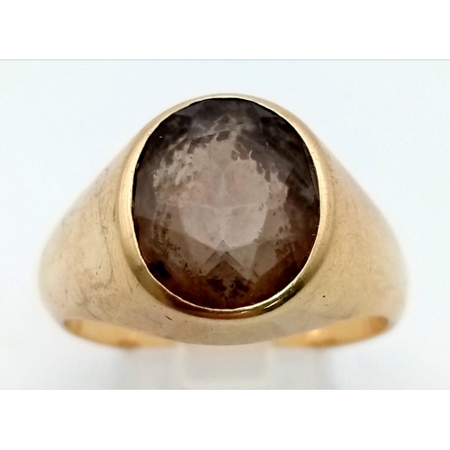 88 - A 9K Yellow Gold Smokey Quartz Gents Ring. Size W. 10.27g total weight.