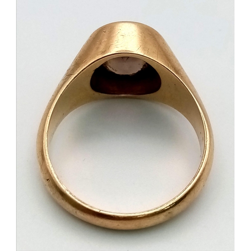 88 - A 9K Yellow Gold Smokey Quartz Gents Ring. Size W. 10.27g total weight.