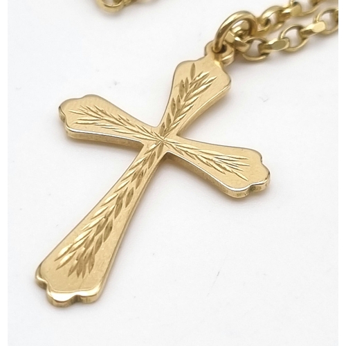 9 - A 9K Yellow Gold Cross Pendant on a 9K Yellow Gold Link Chain. 35mm and 50cm. 10.15g total weight.