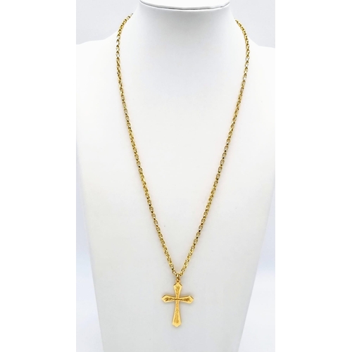 9 - A 9K Yellow Gold Cross Pendant on a 9K Yellow Gold Link Chain. 35mm and 50cm. 10.15g total weight.