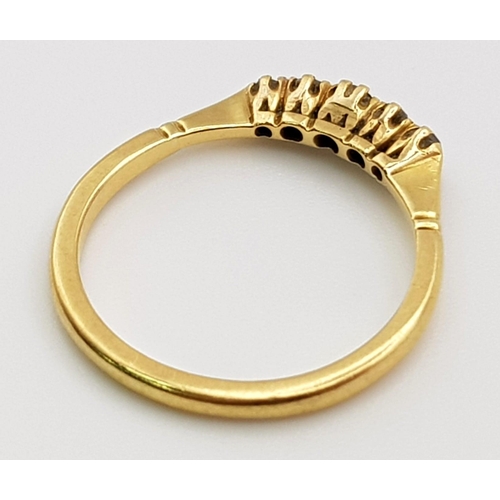 211 - An 18 K yellow gold ring with a band of five diamonds (0.20 carats) on top. Ring size: P, weight: 2.... 