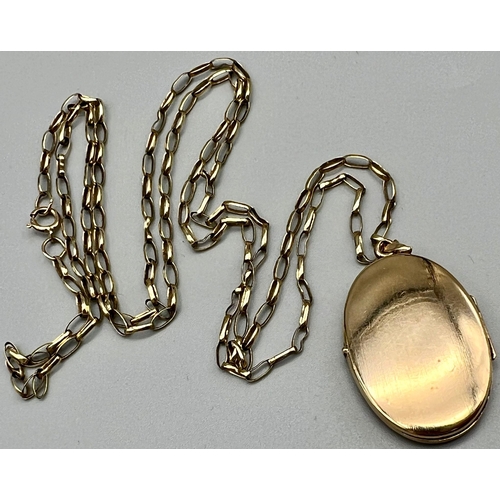 23 - A Vintage 9K Yellow Gold Locket on a 9K Yellow Gold Chain. 35mm and 76cm. 9.17g total weight