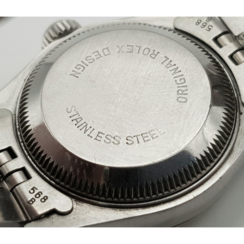 264 - A Rolex Oyster Perpetual Datejust Ladies Watch. Stainless steel strap and case - 26mm. Silver tone d... 